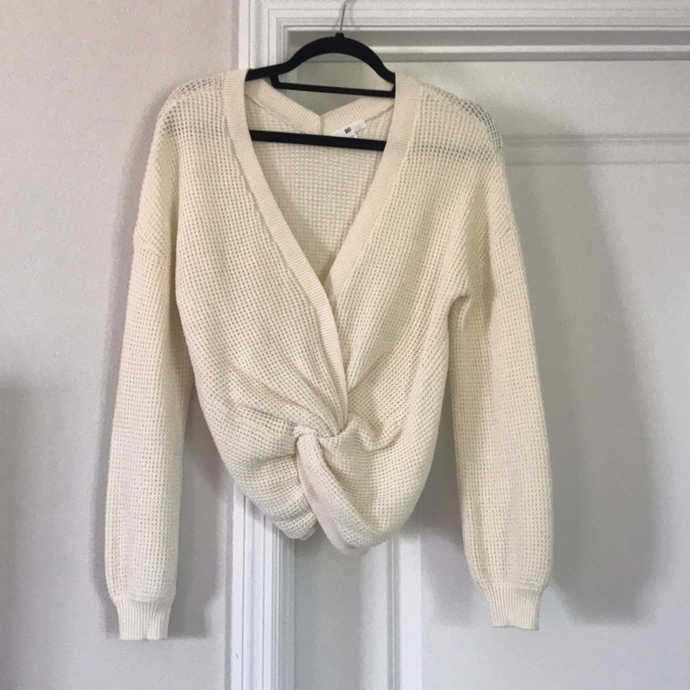 BP cream sweater